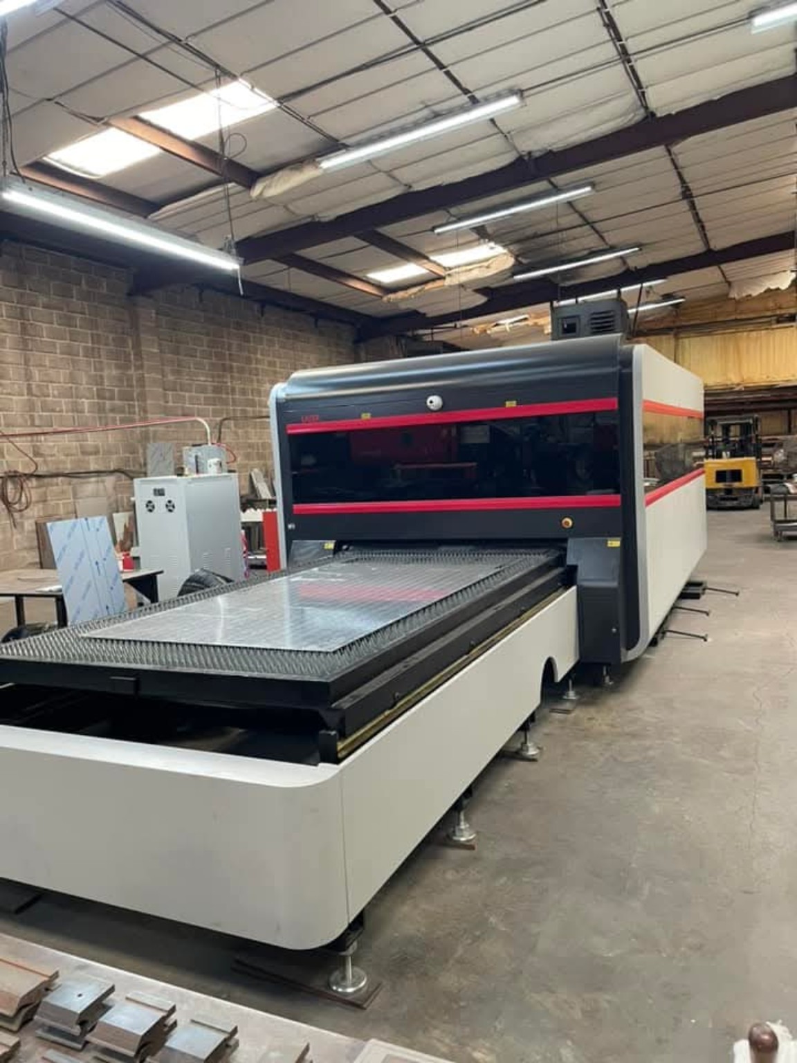 Large sheet metal laser cutting machine in the Custom Fabrication shop