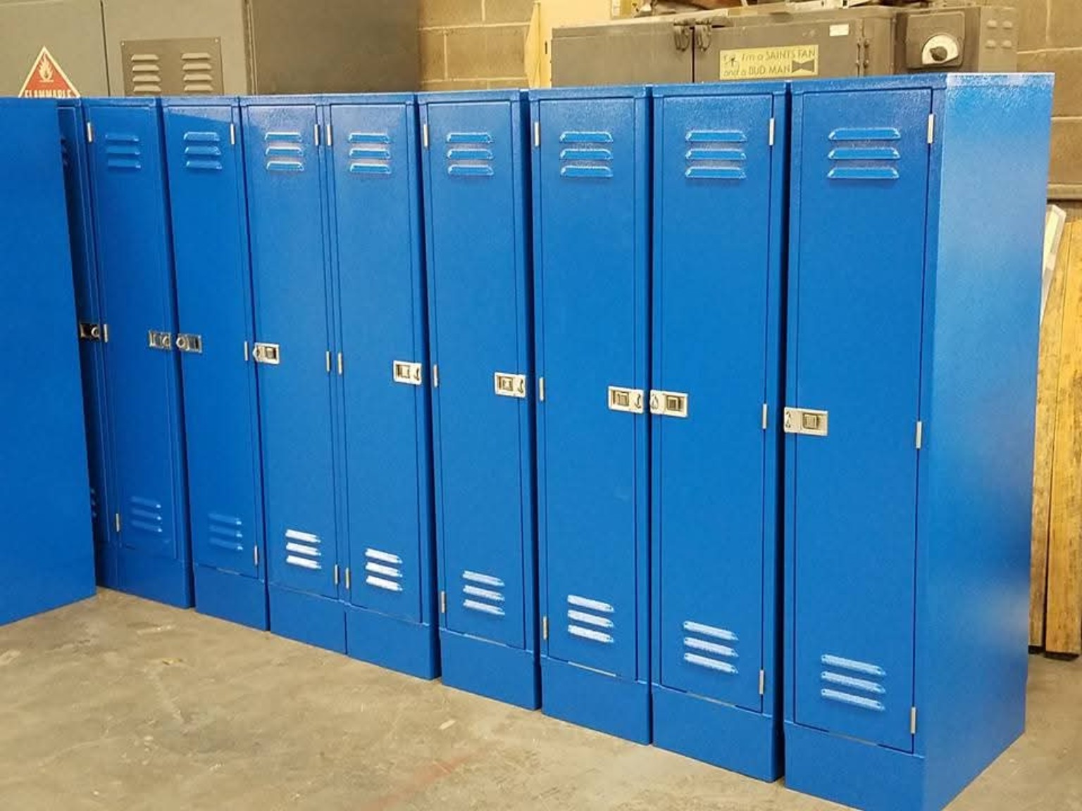 Blue fabricated metal lockers in a row